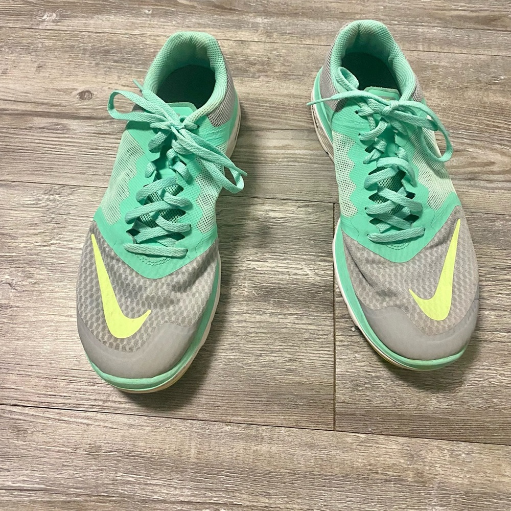 Women’s Green Nike Running Sneakers